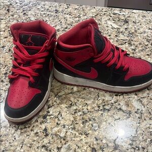 Air Jordan Black and Red Sneakers